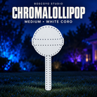ChromaLollipop Medium by Boscoyo Studio, unlit white coro prop on a dark blue evening yard background.