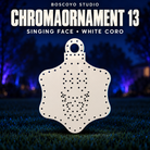 ChromaOrnament 13 by Boscoyo Studio, original unlit coro prop on a dark blue evening yard background.