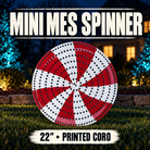 Boscoyo Mini Mes Spinner coro prop shown against a dark twilight backdrop; original product shape and perforations visible.