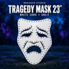 Boscoyo Mardi Gras Tragedy Mask 23-inch white coro version with original cutouts and empty pixel holes, unlit on a dark blue evening yard.