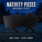 Boscoyo Nativity individual coro pieces; unlit black Baby Jesus piece shown.