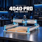 Genmitsu 4040-PRO CNC router with its original photographed frame, bed, spindle and hardware on a dark workshop bench.