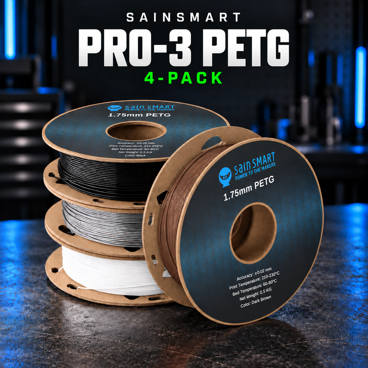 SainSmart PRO-3 PETG four-pack with black, white, brown and silver filament on four cardboard spools.